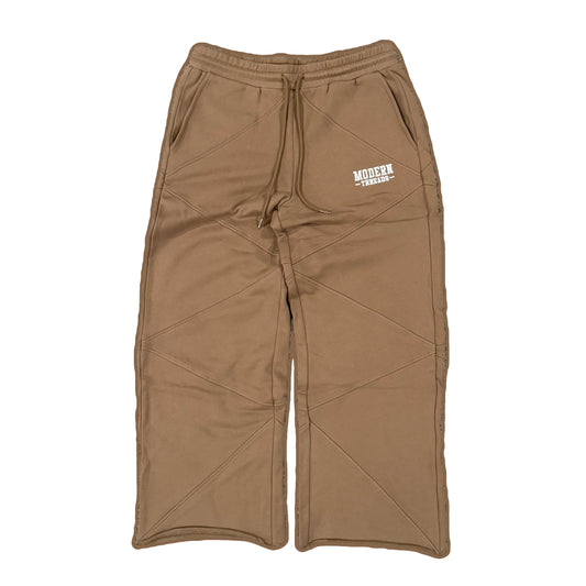 A pair of brown relaxed wide-leg sweatpants with a drawstring waistband and pockets, made from recycled cotton.